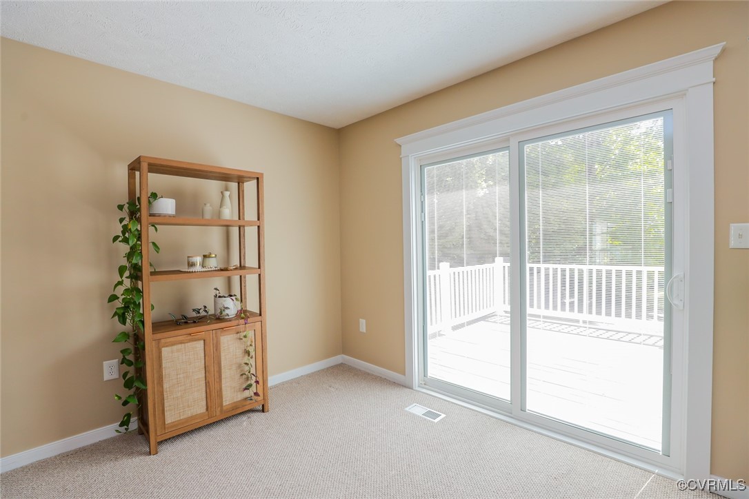 11400 Bailey Mountain Trail Midlothian, VA 23112 - Photo 11 of 41 an empty room with windows