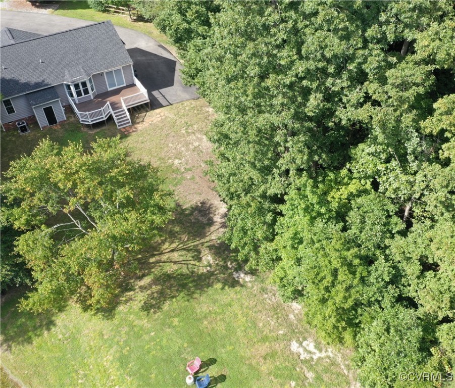 11400 Bailey Mountain Trail Midlothian, VA 23112 - Photo 17 of 41 an aerial view of a house with swimming pool and garden
