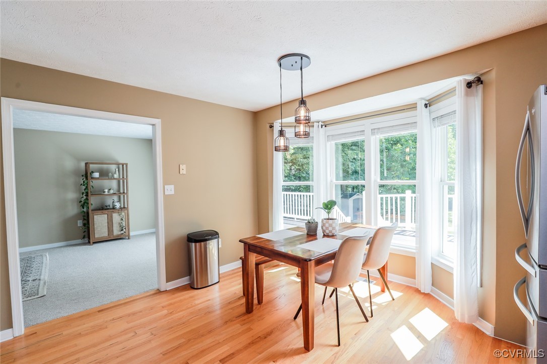 11400 Bailey Mountain Trail Midlothian, VA 23112 - Photo 25 of 41 a workspace with furniture window and wooden floor