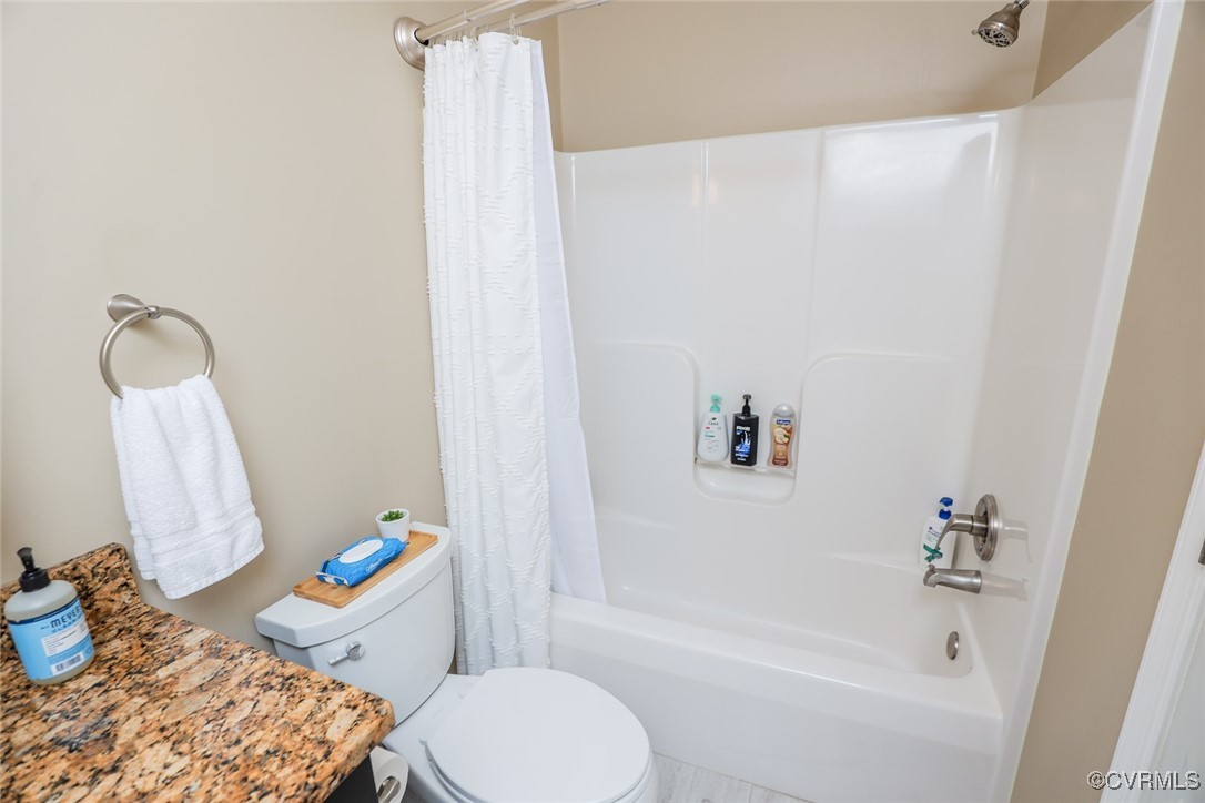 11400 Bailey Mountain Trail Midlothian, VA 23112 - Photo 35 of 41 a bathroom with a sink toilet and bathtub