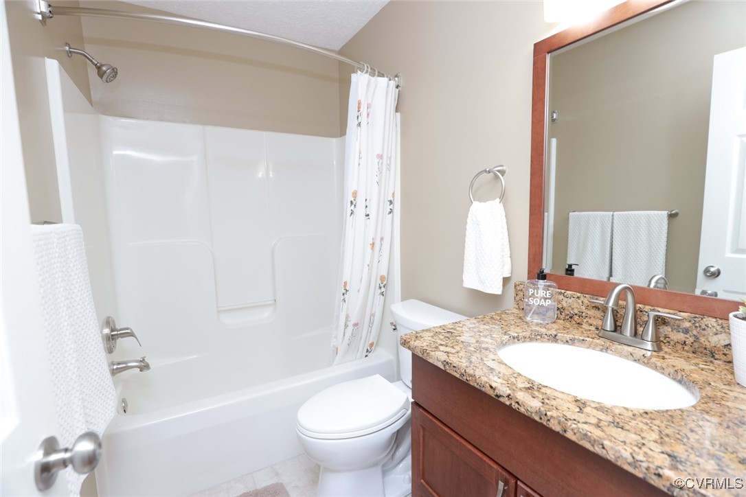 11400 Bailey Mountain Trail Midlothian, VA 23112 - Photo 37 of 41 a bathroom with a granite countertop sink a toilet a mirror and shower