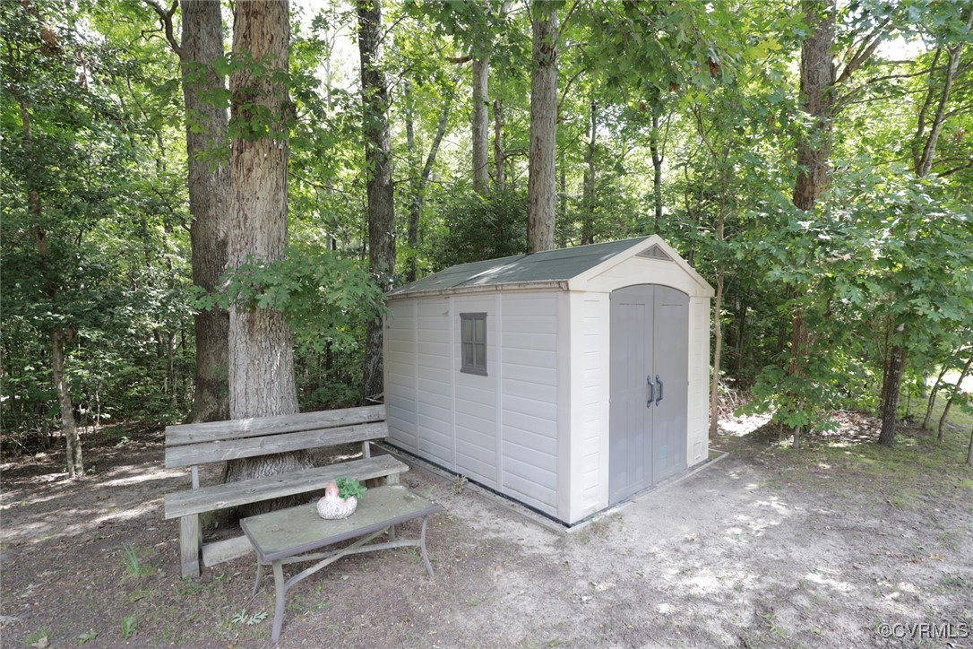 11400 Bailey Mountain Trail Midlothian, VA 23112 - Photo 38 of 41 a view of a small yard in a back yard