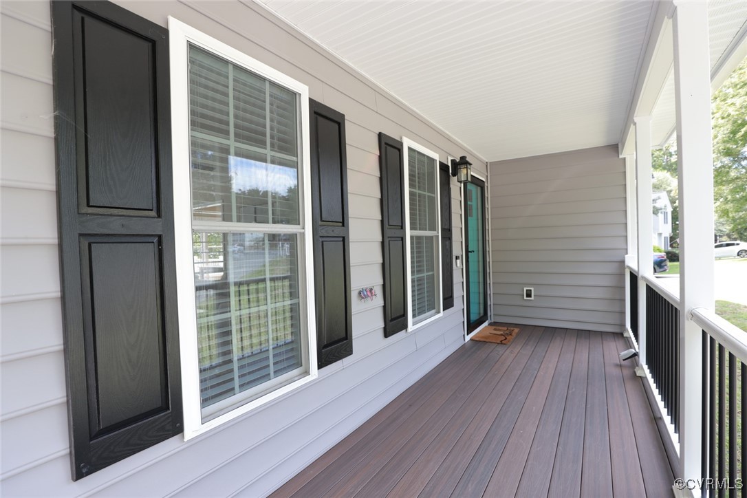 11400 Bailey Mountain Trail Midlothian, VA 23112 - Photo 4 of 41 a view of front door deck and wooden floor