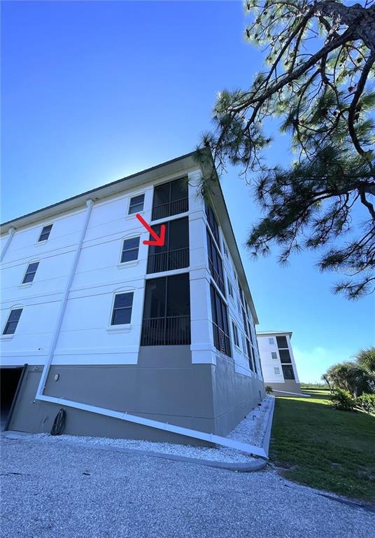9203 Griggs Road, Unit 204 Englewood, FL 34224 - Photo 2 of 32 a view of entryway