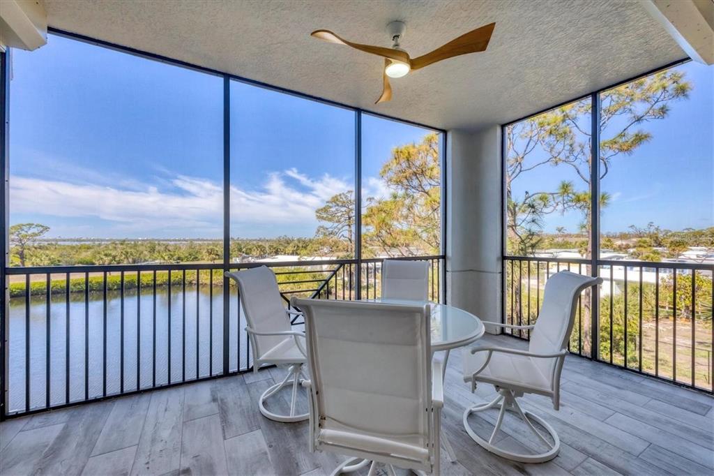 9203 Griggs Road, Unit 204 Englewood, FL 34224 - Photo 21 of 32 a view of a balcony with furniture