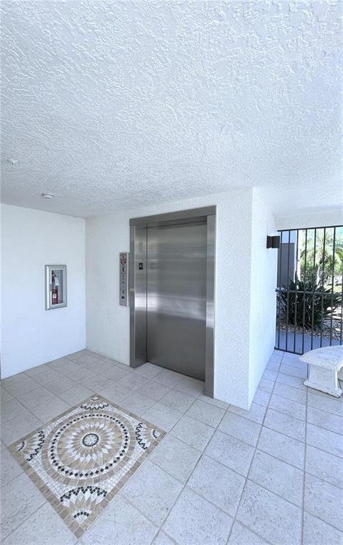 9203 Griggs Road, Unit 204 Englewood, FL 34224 - Photo 22 of 32 a view of an empty room and window