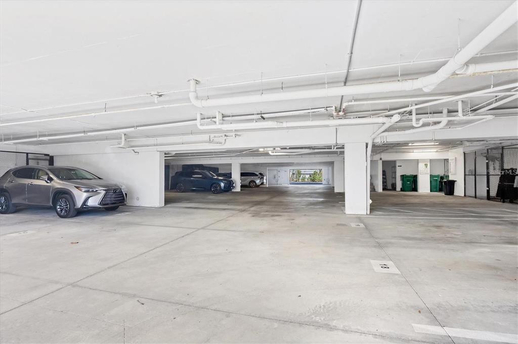 9203 Griggs Road, Unit 204 Englewood, FL 34224 - Photo 25 of 32 a view of a car garage