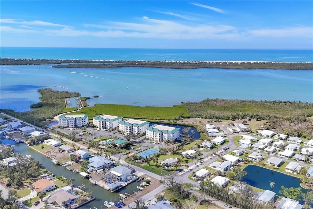 9203 Griggs Road, Unit 204 Englewood, FL 34224 - Photo 31 of 32 a view of a city and ocean view