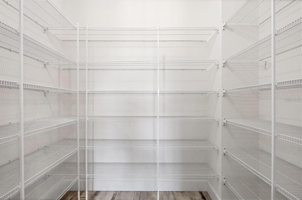 9203 Griggs Road, Unit 204 Englewood, FL 34224 - Photo 10 of 32 a view of a room with empty racks