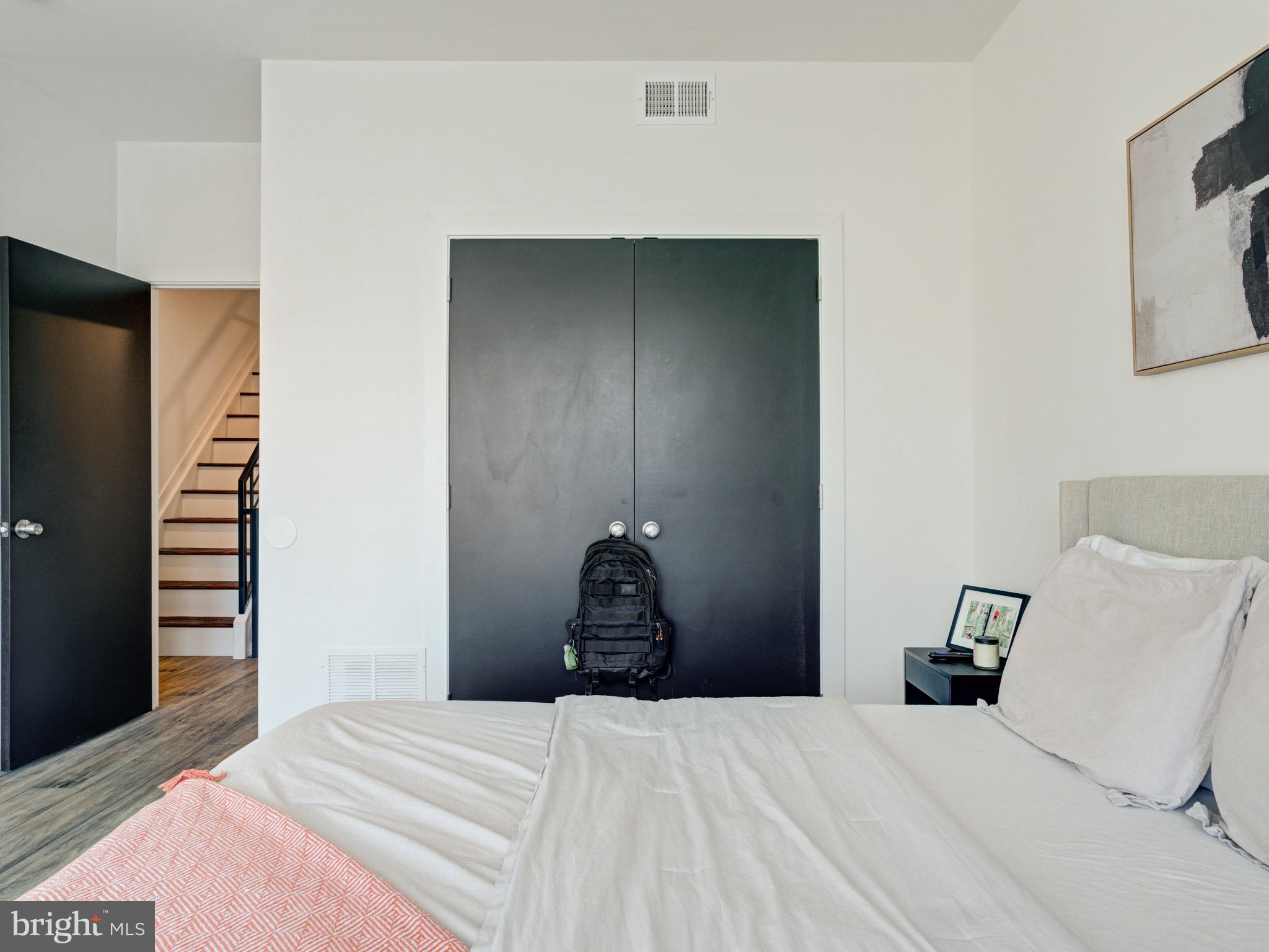 1931 Colonial Street Philadelphia, PA 19138 - Photo 21 of 38 a bedroom with a bed and a lamp