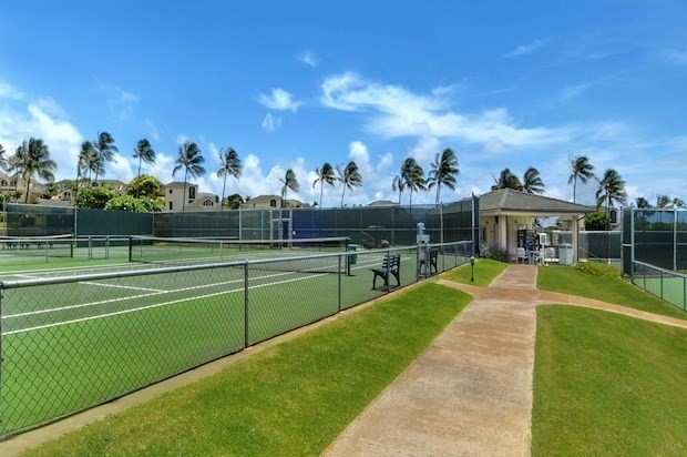 2387 Ho'ohu Road, Unit 221 Koloa, HI 96756 - Photo 7 of 25 a view of a swimming pool and a yard