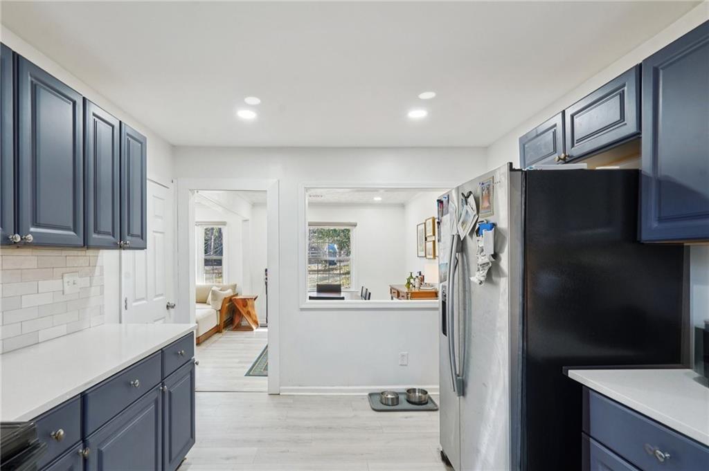 1145 Fayetteville Road Southeast Atlanta, GA 30316 - Photo 14 of 24 a kitchen with stainless steel appliances granite countertop a refrigerator and a sink
