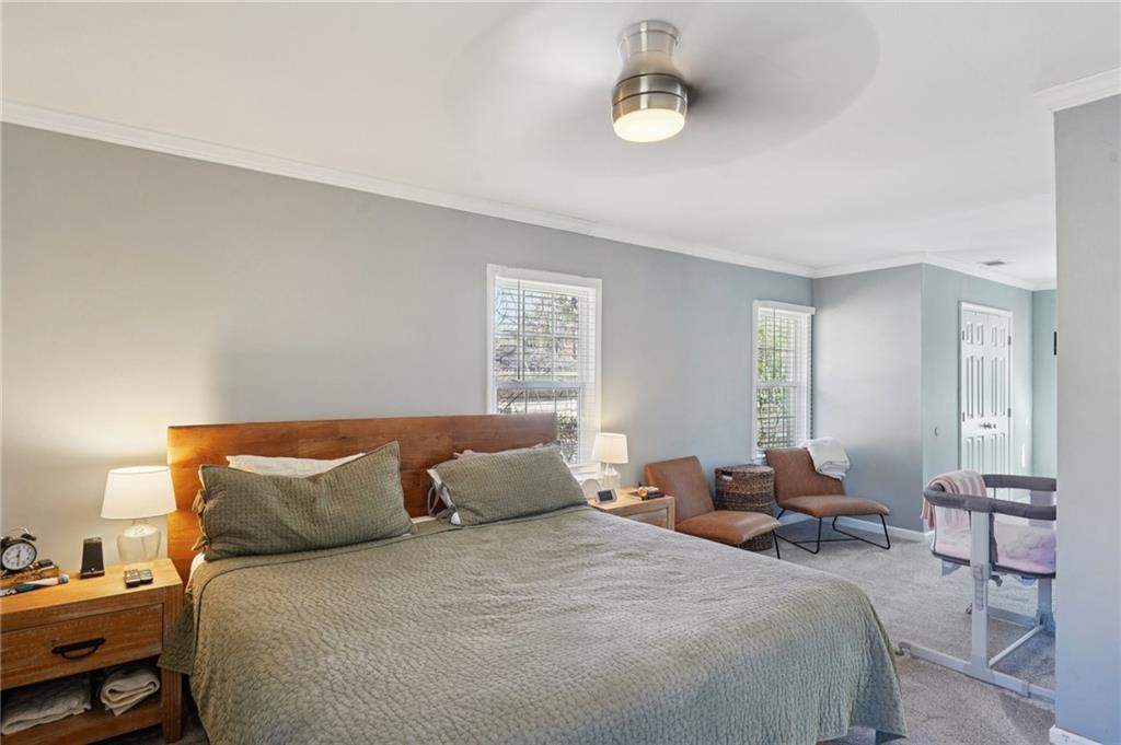 1145 Fayetteville Road Southeast Atlanta, GA 30316 - Photo 17 of 24 a bedroom with a bed and window