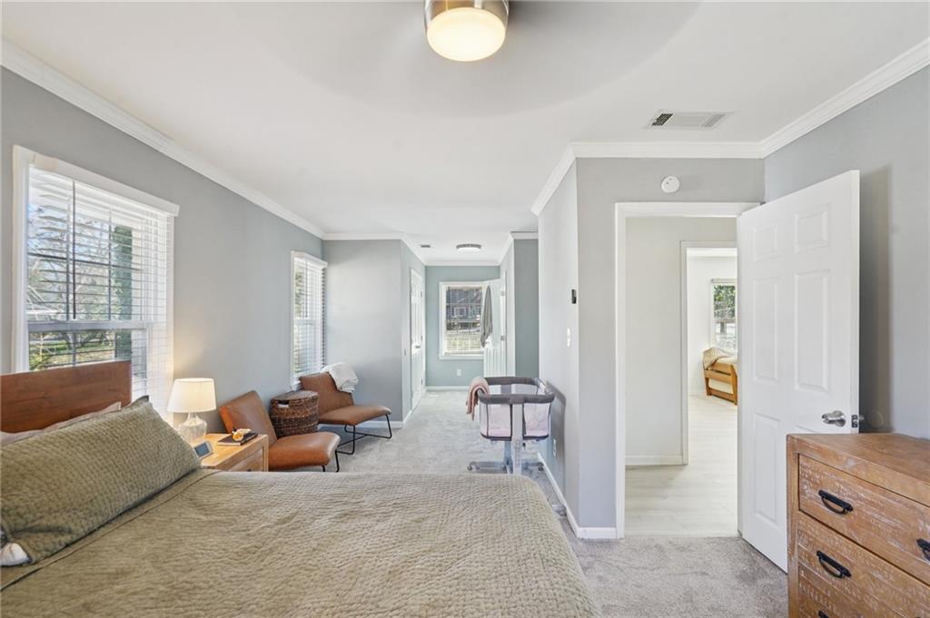 1145 Fayetteville Road Southeast Atlanta, GA 30316 - Photo 19 of 24 a living room with furniture and a window