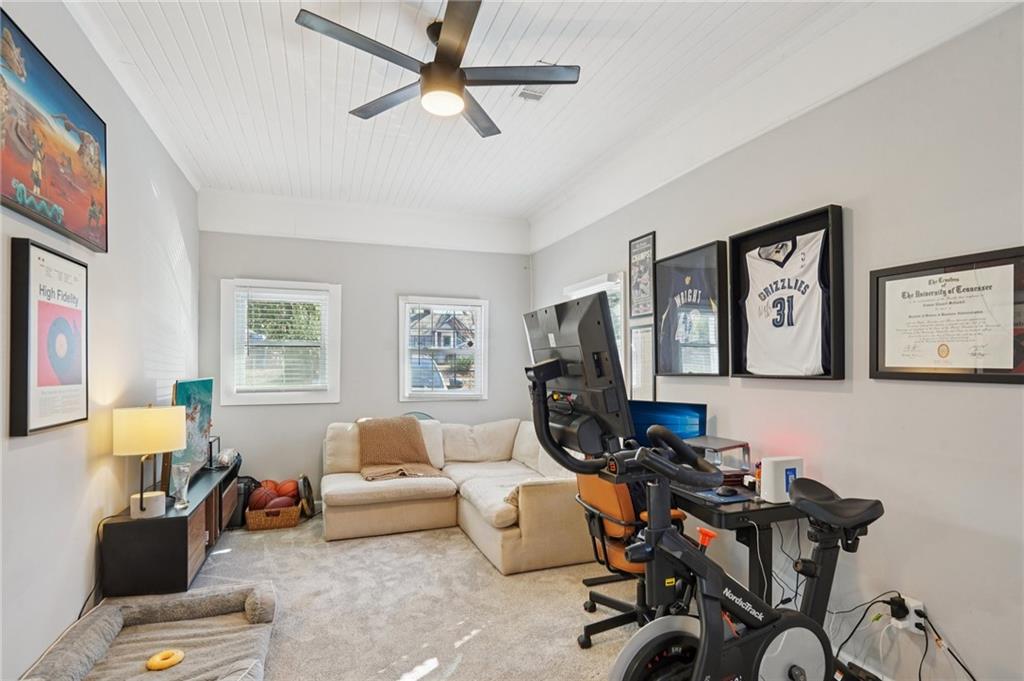 1145 Fayetteville Road Southeast Atlanta, GA 30316 - Photo 20 of 24 a living room with furniture and a window