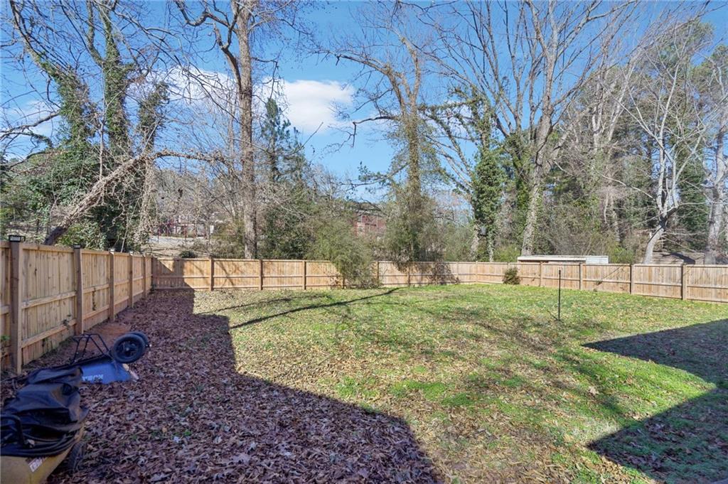 1145 Fayetteville Road Southeast Atlanta, GA 30316 - Photo 23 of 24 a view of backyard with tree