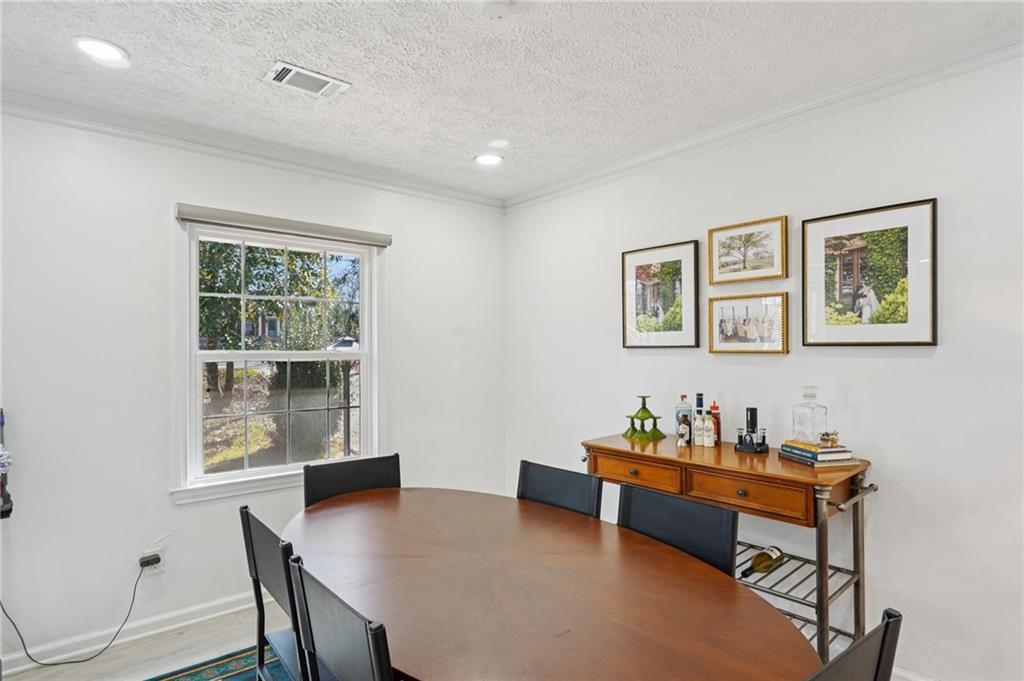 1145 Fayetteville Road Southeast Atlanta, GA 30316 - Photo 9 of 24 a reading room with furniture and a window