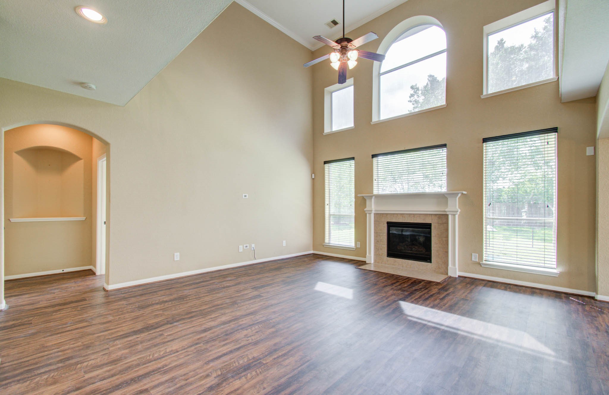 21331 Parham Circle Spring, TX 77388 - Photo 12 of 48 The wall of windows allows an abundance of natural light throughout the home.