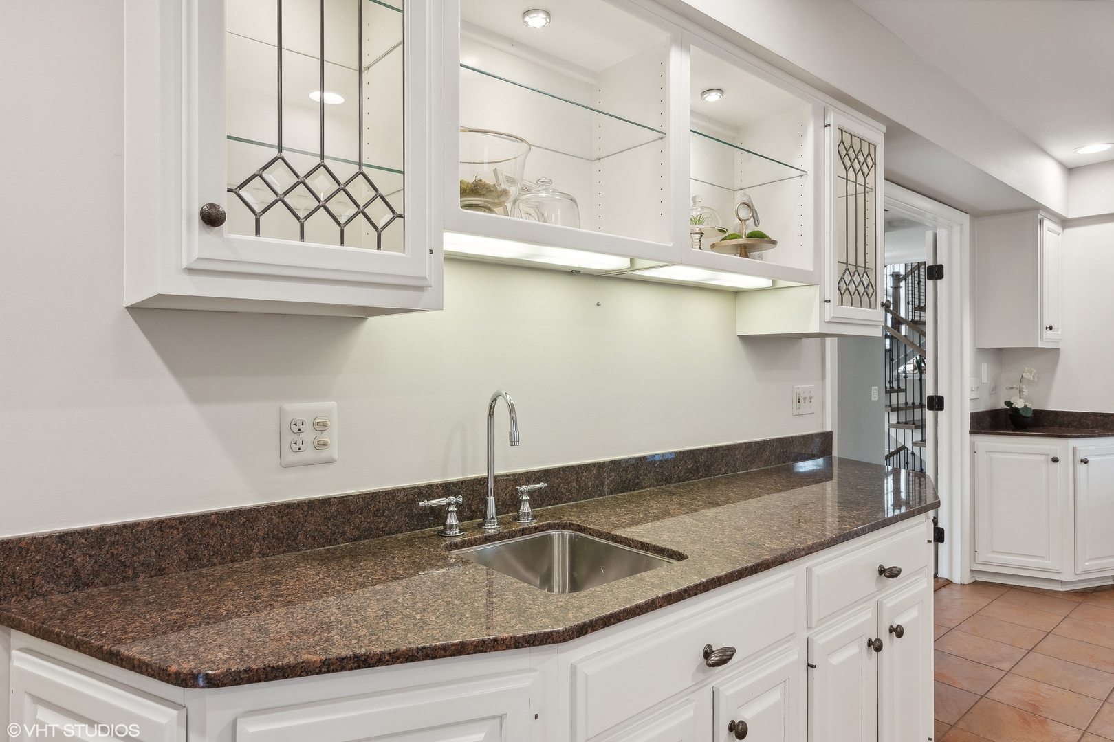 1364 Turvey Road Downers Grove, IL 60515 - Photo 18 of 35 a kitchen with granite countertop a sink and cabinets