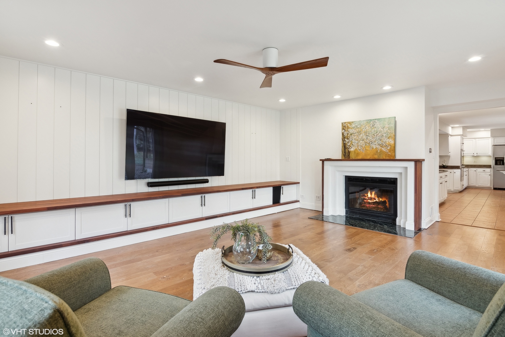 1364 Turvey Road Downers Grove, IL 60515 - Photo 20 of 35 a living room with furniture and a flat screen tv