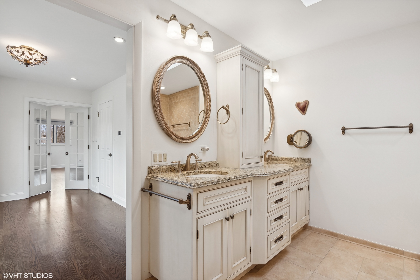 1364 Turvey Road Downers Grove, IL 60515 - Photo 30 of 35 a bathroom with a double vanity sink and a mirror