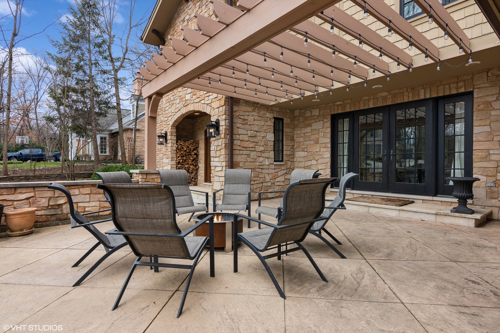 1364 Turvey Road Downers Grove, IL 60515 - Photo 6 of 35 a view of a patio with a table and chairs and a barbeque