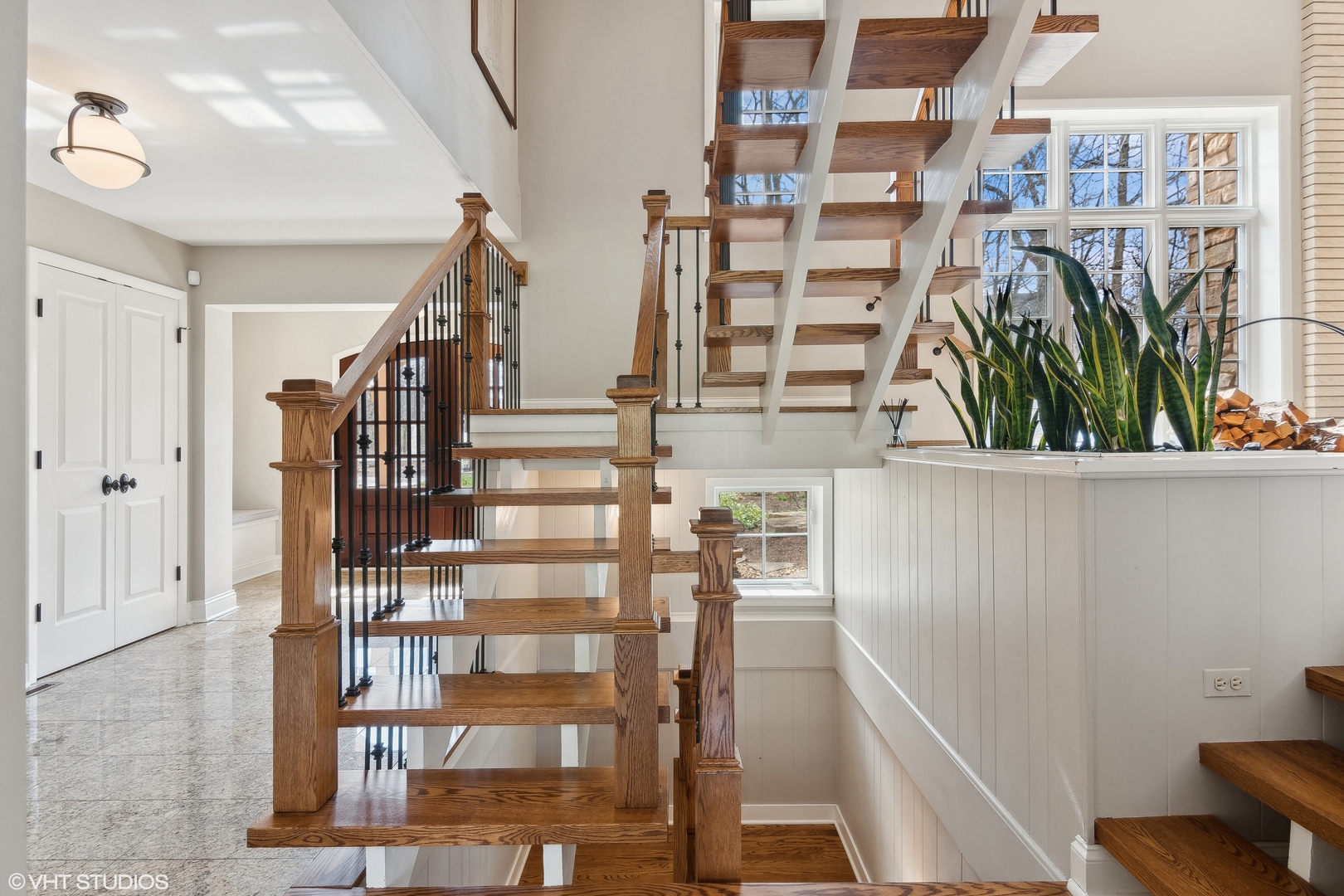 1364 Turvey Road Downers Grove, IL 60515 - Photo 8 of 35 a view of staircase with railing and white walls