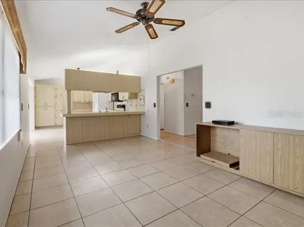 a room with a cabinets and appliances