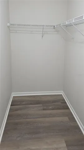 a view of a room with racks on the wall