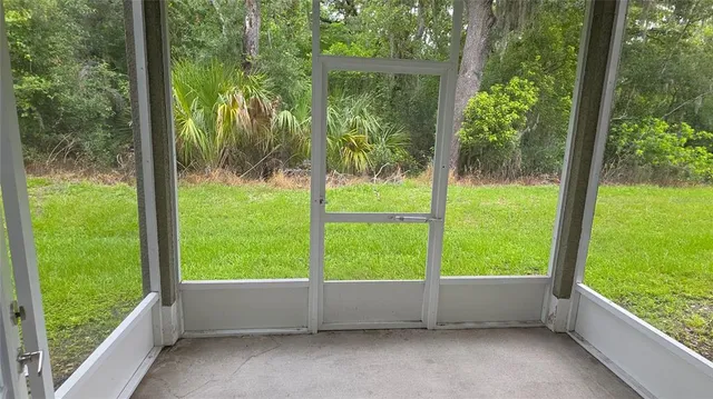 a view of backyard from a balcony