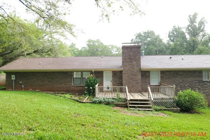 2465 Pate Road Macon, GA 31210 - Photo 15 of 28 an outdoor view of house with backyard and outdoor seating