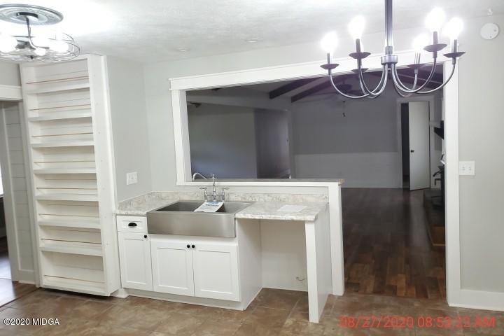 2465 Pate Road Macon, GA 31210 - Photo 3 of 28 a bathroom with a sink and a mirror
