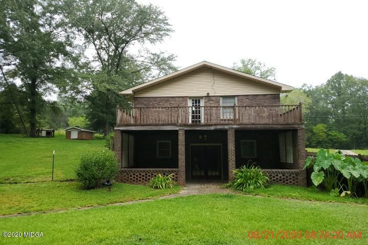 2465 Pate Road Macon, GA 31210 - Photo 21 of 28 a view of a house with a yard and plants