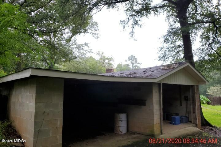 2465 Pate Road Macon, GA 31210 - Photo 24 of 28 a yellow house with tree in the background