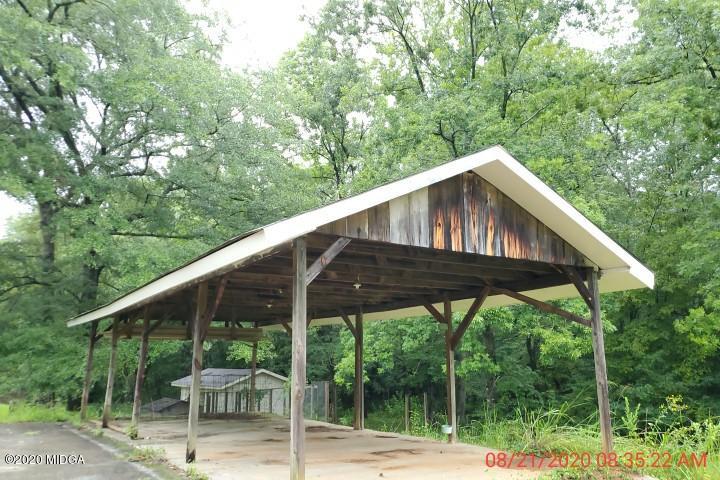 2465 Pate Road Macon, GA 31210 - Photo 26 of 28 a backyard of a house with seating space
