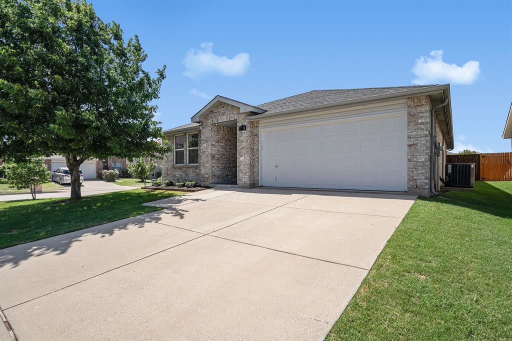 1736 Carolina Ridge Way Fort Worth, TX 76247 - Photo 1 of 1 a front view of a house with a yard