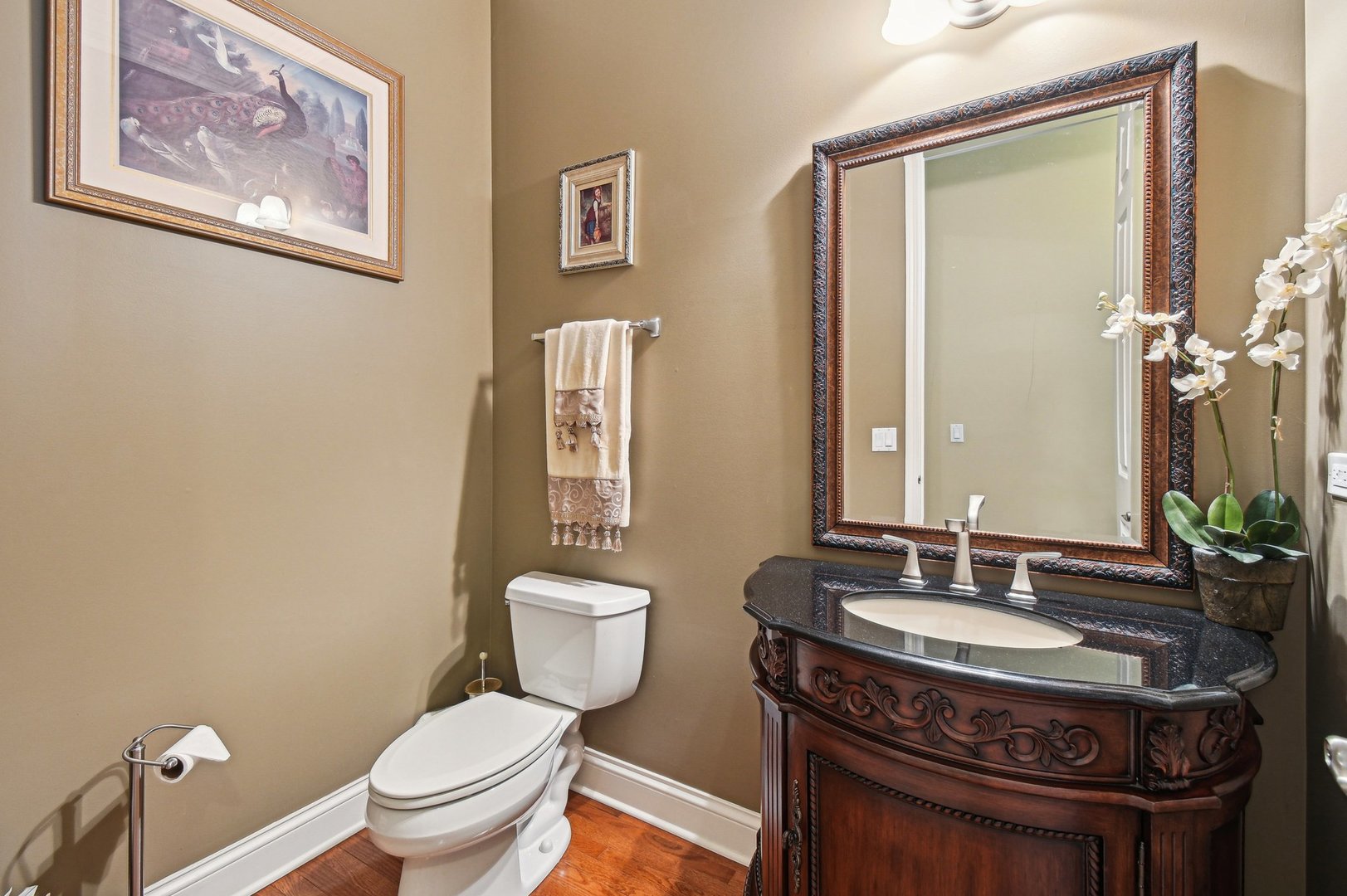 1037 Moray Drive Inverness, IL 60010 - Photo 22 of 50 a bathroom with a granite countertop toilet a sink and a mirror