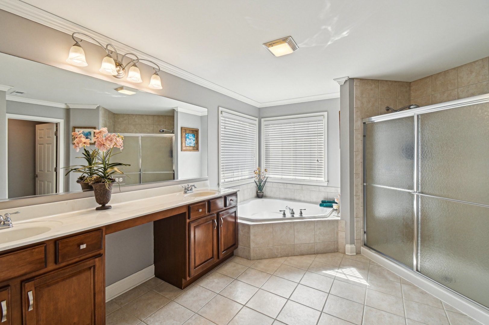 1037 Moray Drive Inverness, IL 60010 - Photo 27 of 50 a bathroom with a tub sink shower and mirror