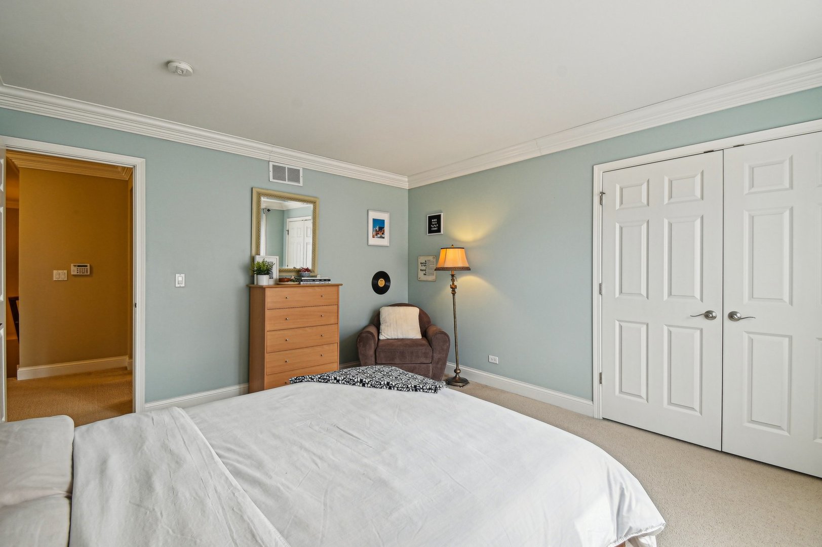 1037 Moray Drive Inverness, IL 60010 - Photo 36 of 50 a bedroom with a bed and wooden floor