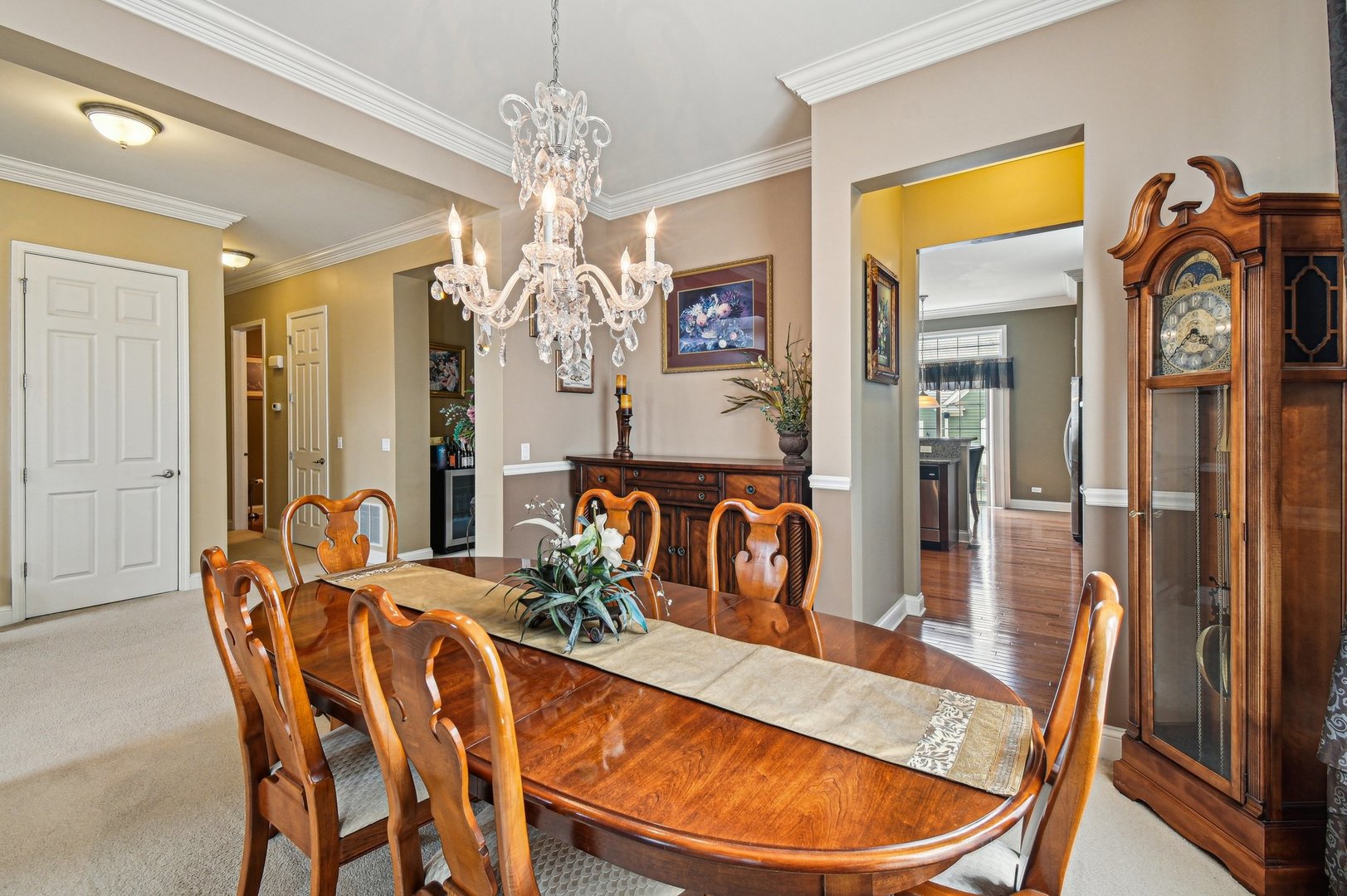 1037 Moray Drive Inverness, IL 60010 - Photo 9 of 50 a dining room with furniture a chandelier and wooden floor