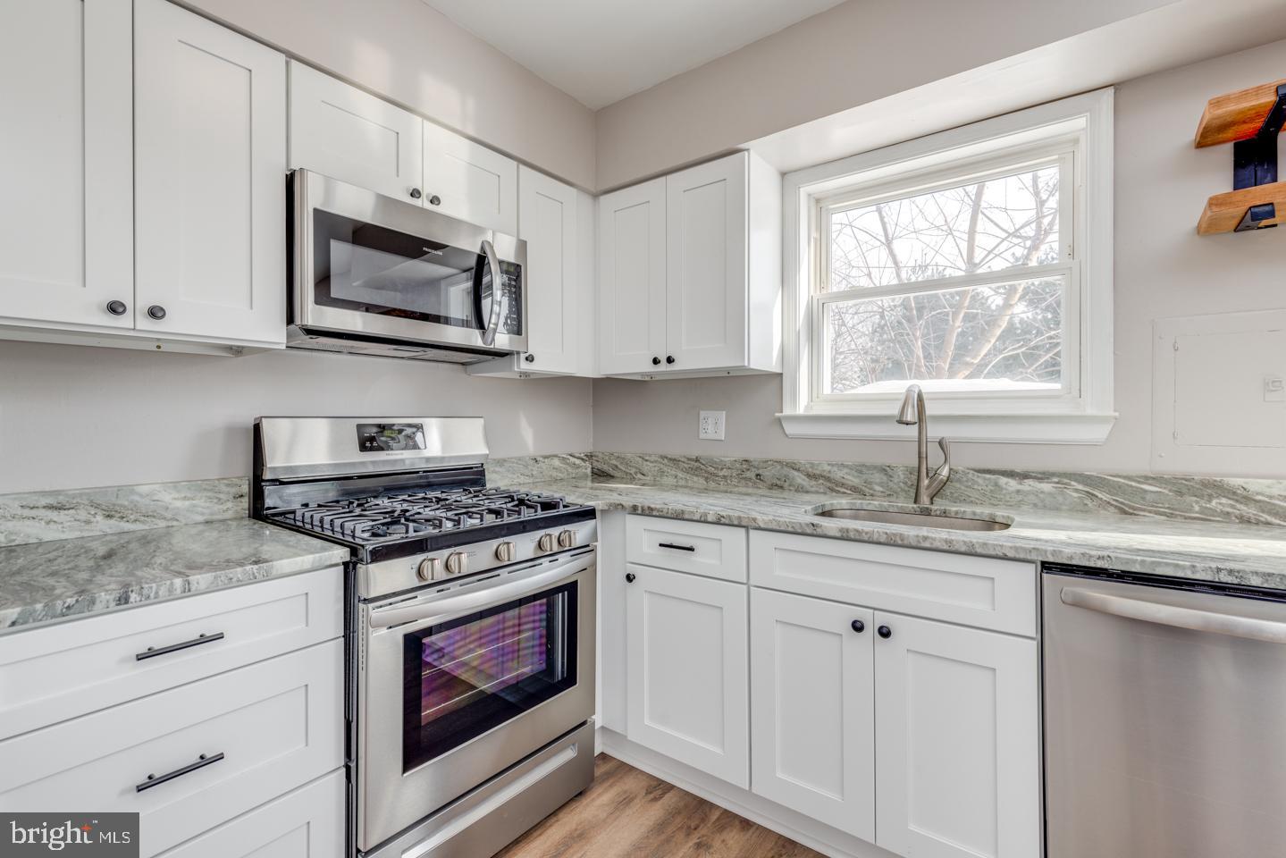 65 Eaves Mill Road Medford, NJ 08055 - Photo 12 of 25 Abundant crisp white cabinets - gas range