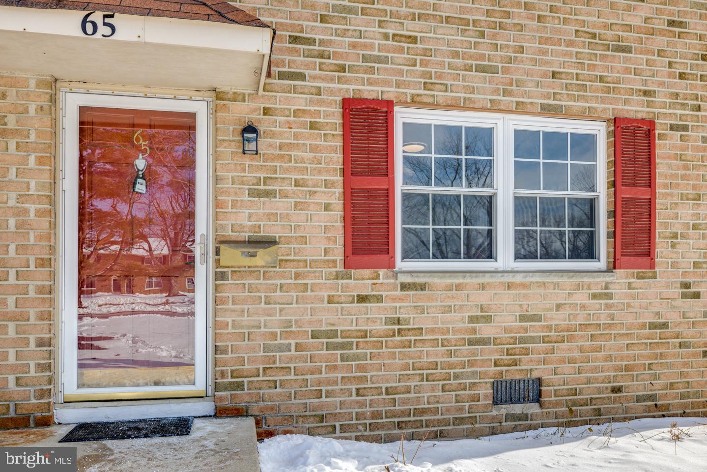 65 Eaves Mill Road Medford, NJ 08055 - Photo 3 of 25 Front entry door with storm door.