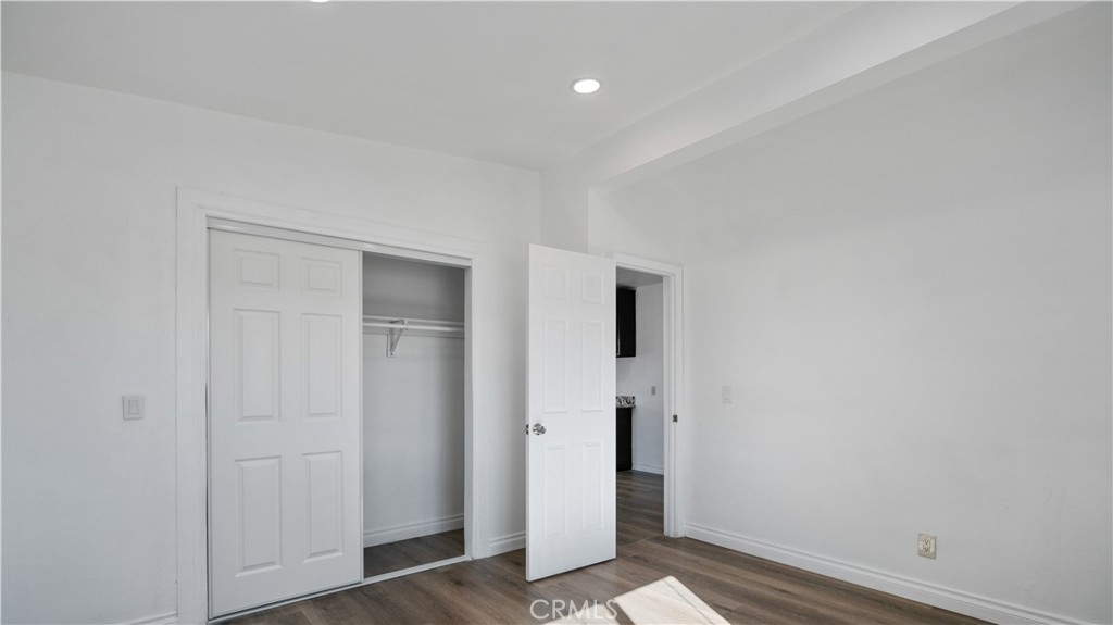 5827 Old Woman Springs Road Johnson Valley, CA 92285 - Photo 12 of 36 wooden floor in an empty room