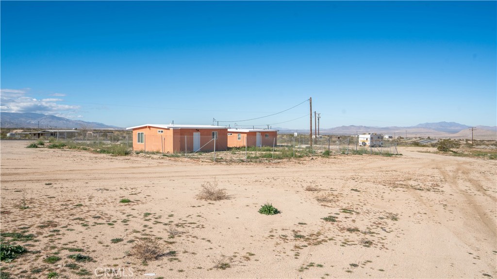 5827 Old Woman Springs Road Johnson Valley, CA 92285 - Photo 28 of 36 a swimming pool with an ocean view