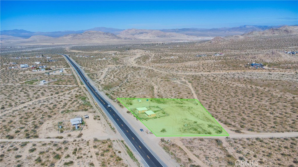 5827 Old Woman Springs Road Johnson Valley, CA 92285 - Photo 32 of 36 a view of mountain with wooden floor