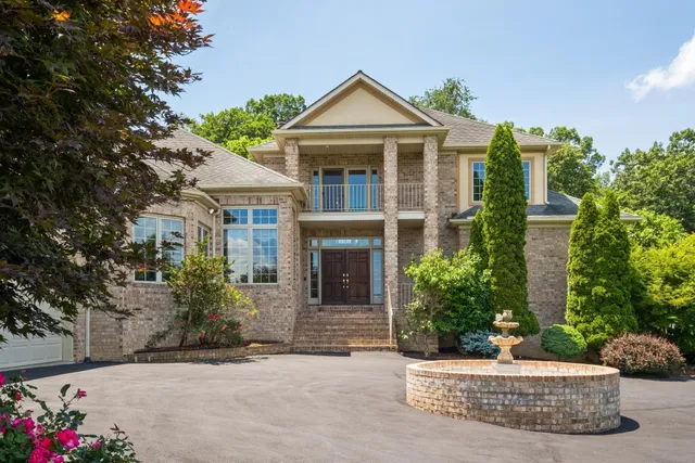 a kitchen with a sink and large window