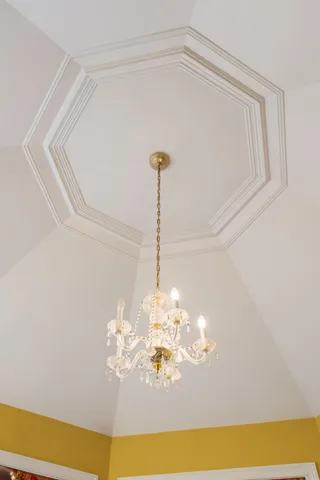 a view of an empty room and a window