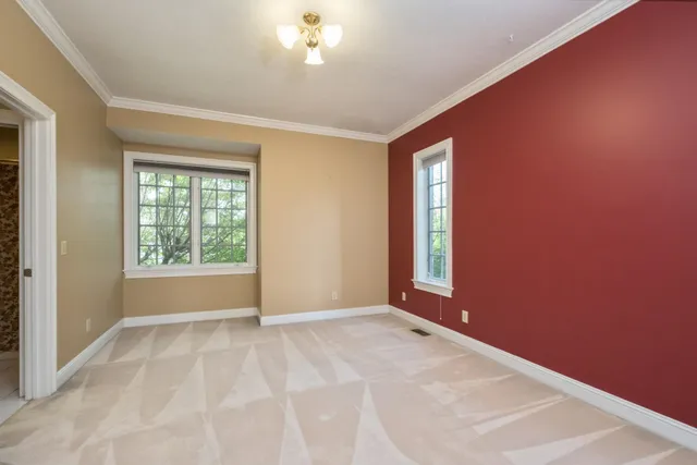 a spacious bathroom with a granite countertop tub and a sink