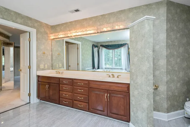 a view of wooden floor in an empty room
