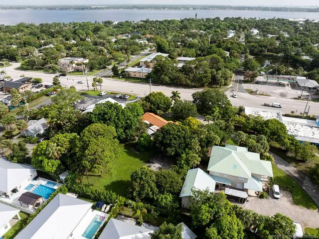 an aerial view of residential house with outdoor space